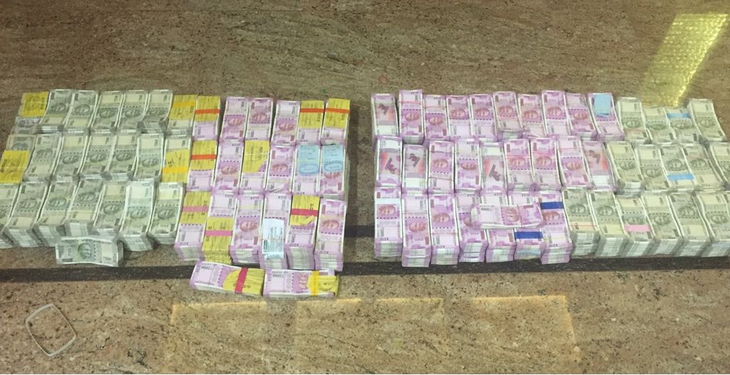 Bundles of unaccounted cash in Rs 2,000 and Rs 500 notes seized from the lockers of contractors at Mysuru in Karnataka.