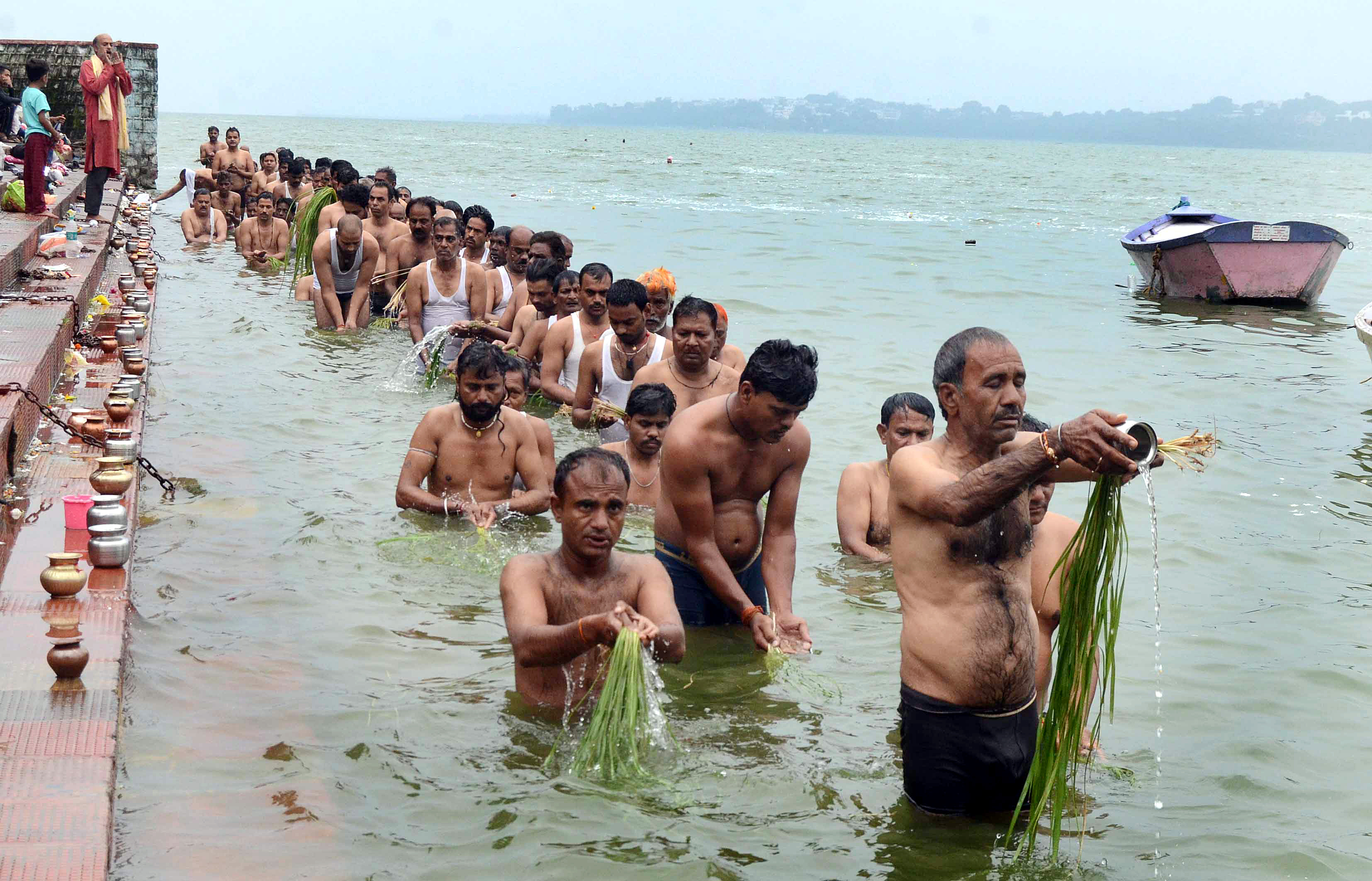 People perform a ritual called 'Tarpan' for the salvation of their ancestors at the banks of the upper lake on the first day of the beginning of 'Pitra Paksh'